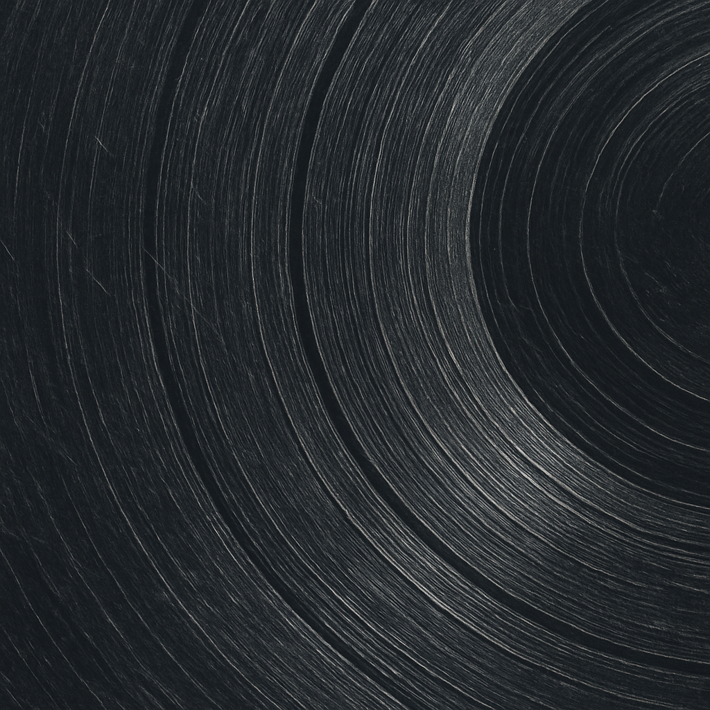 Abstract artwork with layered echoes of red and green rings fading into each other, symbolising sound waves.